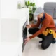 Technician installing an indoor fireplace in a Burlingame home