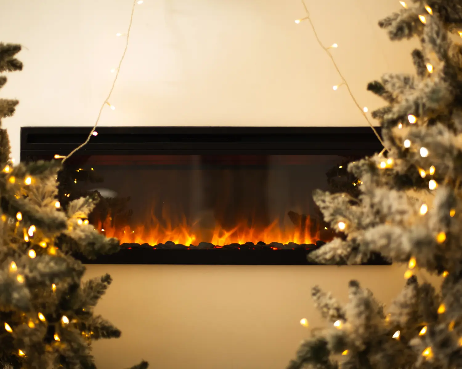 Modern electric fireplace with warm flame effect and decorative lights
